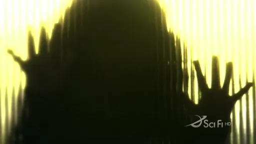 Silueta de unas manos apoyadas contra un fondo amarillo brillante en Battlestar Galactica