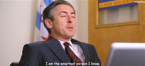 Eli Gold sentado con los ojos cerrados y el subtítulo «I am the smartest person I know» en The Good Wife