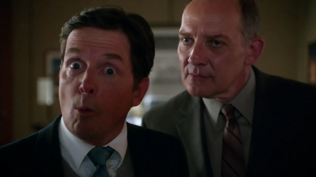 Primer plano de Lee y Canning poniendo cara de sorpresa en The Good Wife